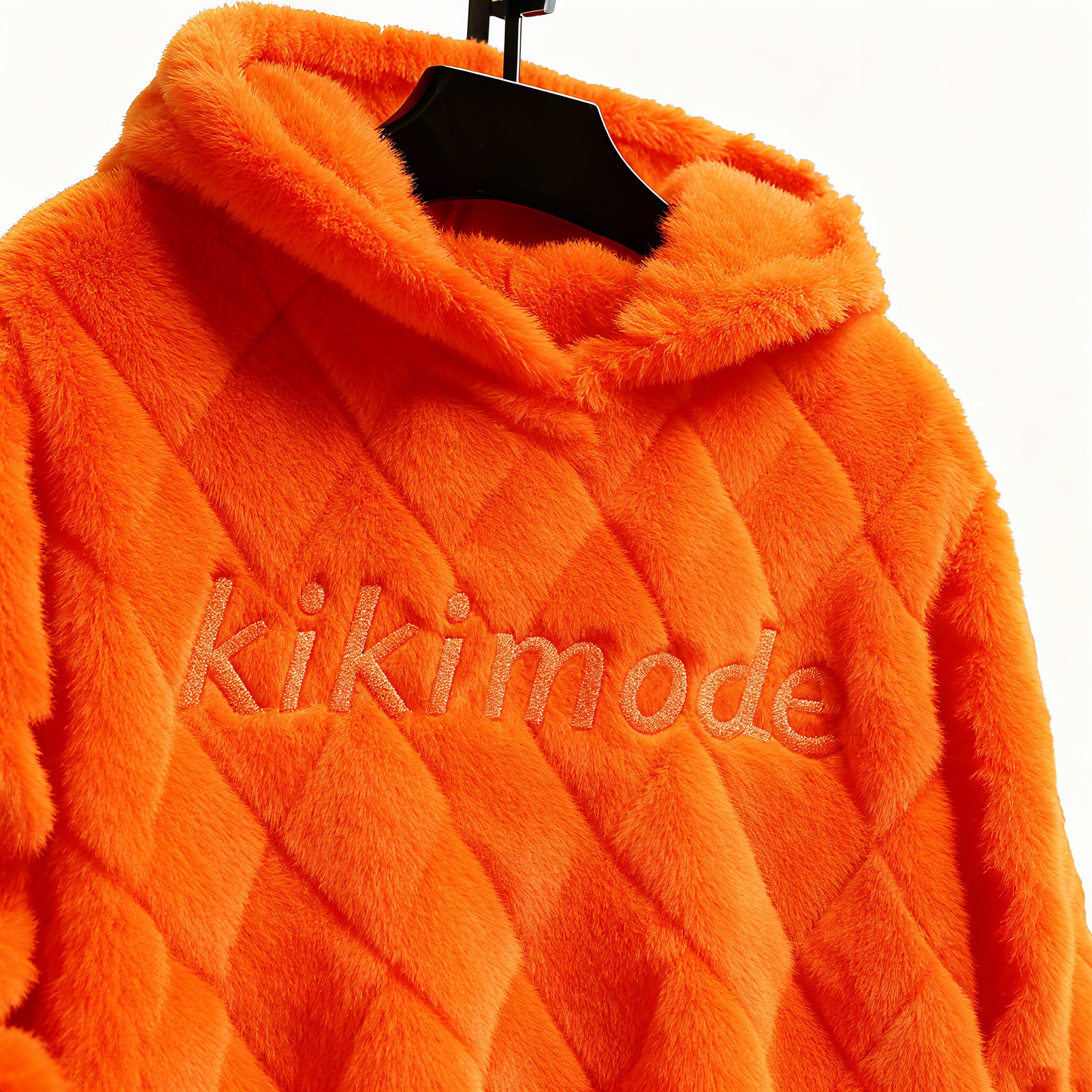 100% Polyester Orange Fuzzy Quilted Hoodie: Vibrant Style & Cloud-Like Comfort